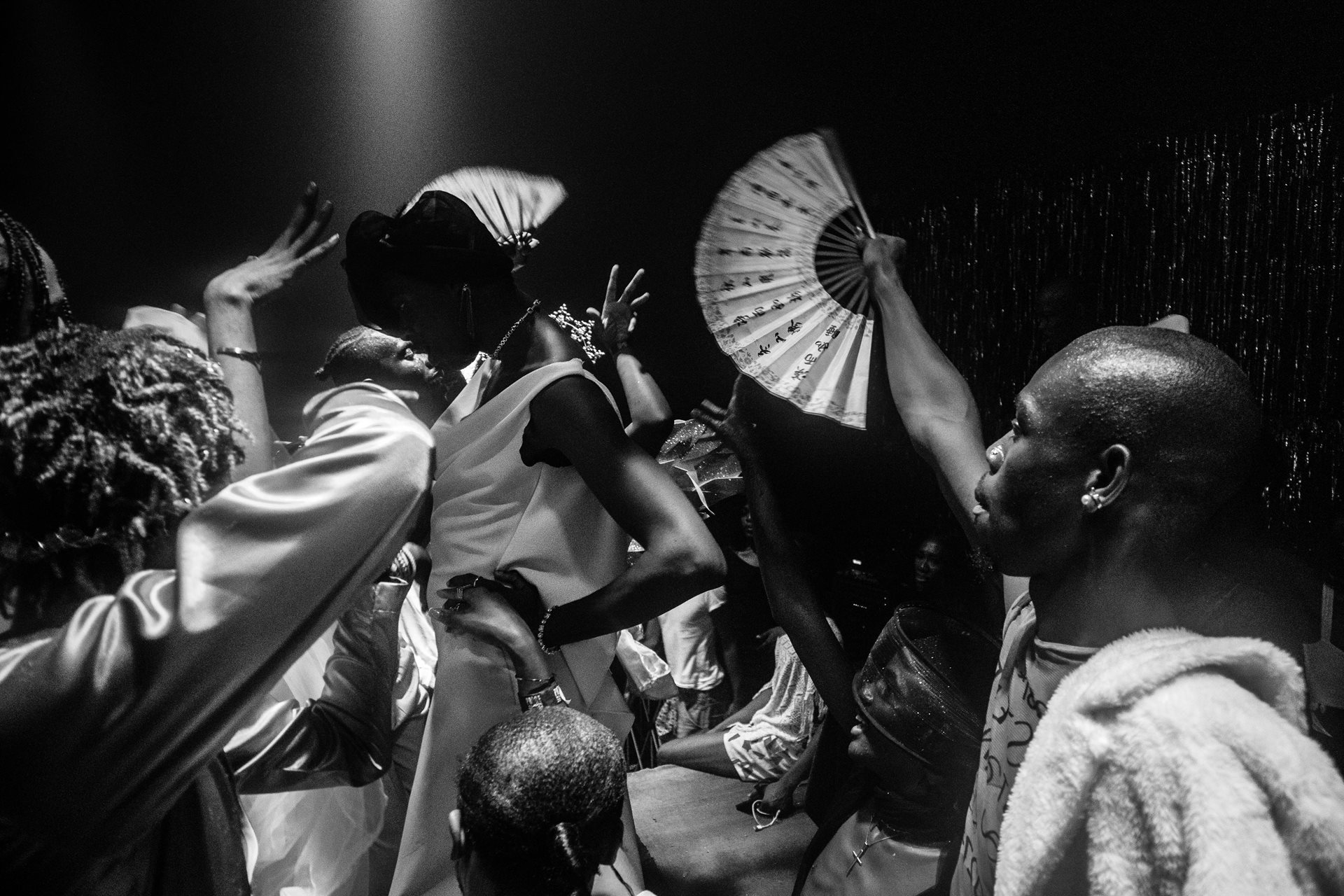 Participants at &ldquo;Heavenly Bodies,&rdquo; an underground drag ballroom event during Lagos Pride, celebrate the &ldquo;mother of the year&rdquo; winner.